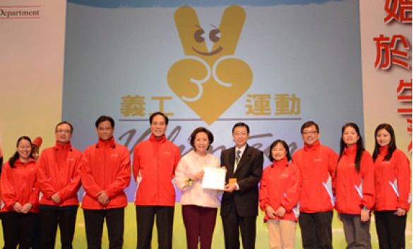 Mr. SUEN Kwok-lam and Team of Care volunteers